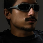 man wearing mercurial gray sunglasses side view